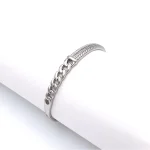 دستبند النگویی زنانه ژوپینگ مدل زنجیری با نگین‌های اتریشی مخراج شده، روکش رودیوم، رنگ ثابت، ضد حساسیت، قفل جواهری فشاری و طراحی لوکس مشابه جواهرات طلا.